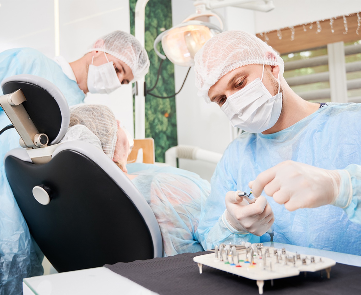 Dentist treating a patient at Dental House