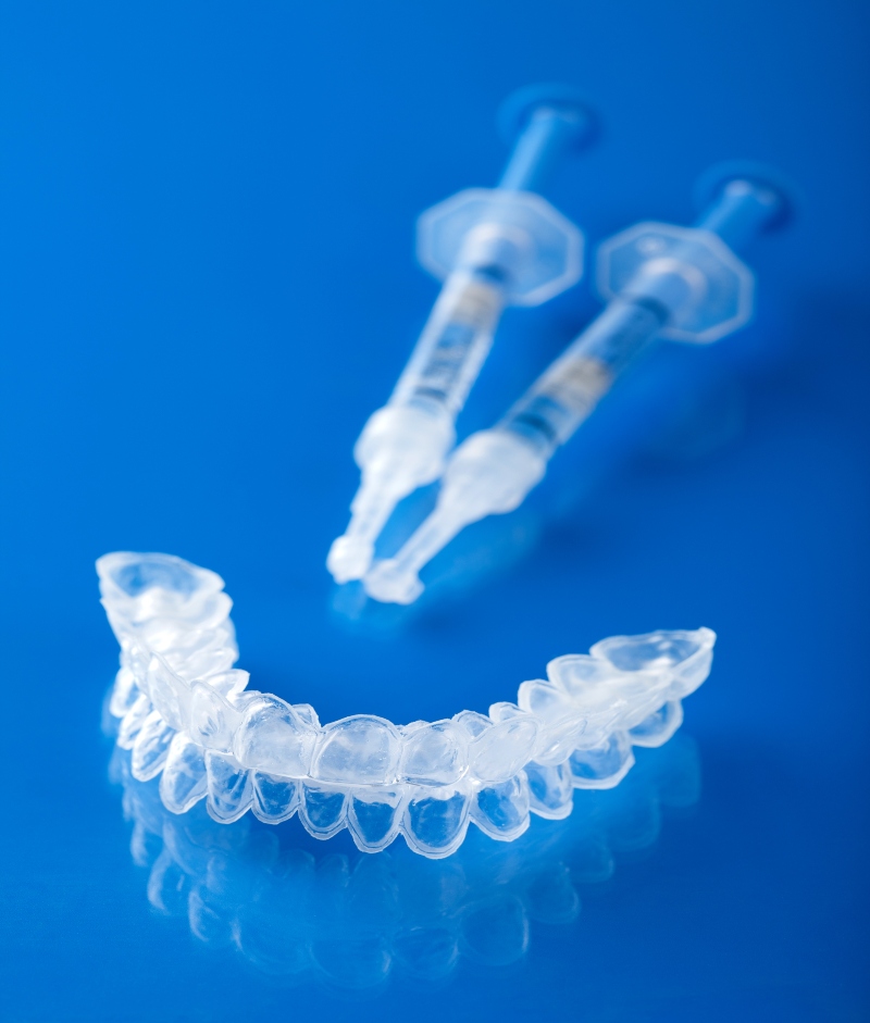 Patient smiling after teeth whitening