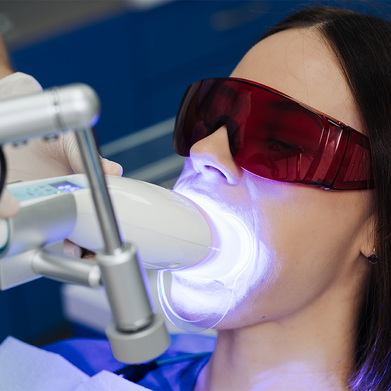 Patient having teeth whitening treatment